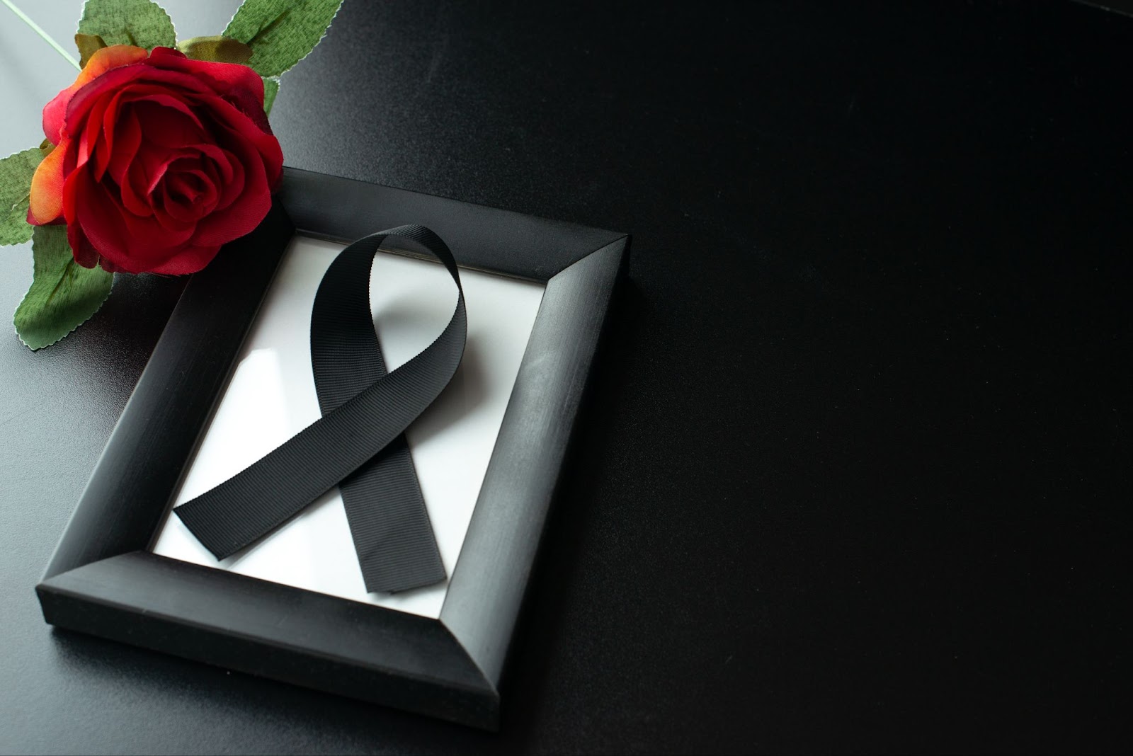 Top view of picture frame with black bow
