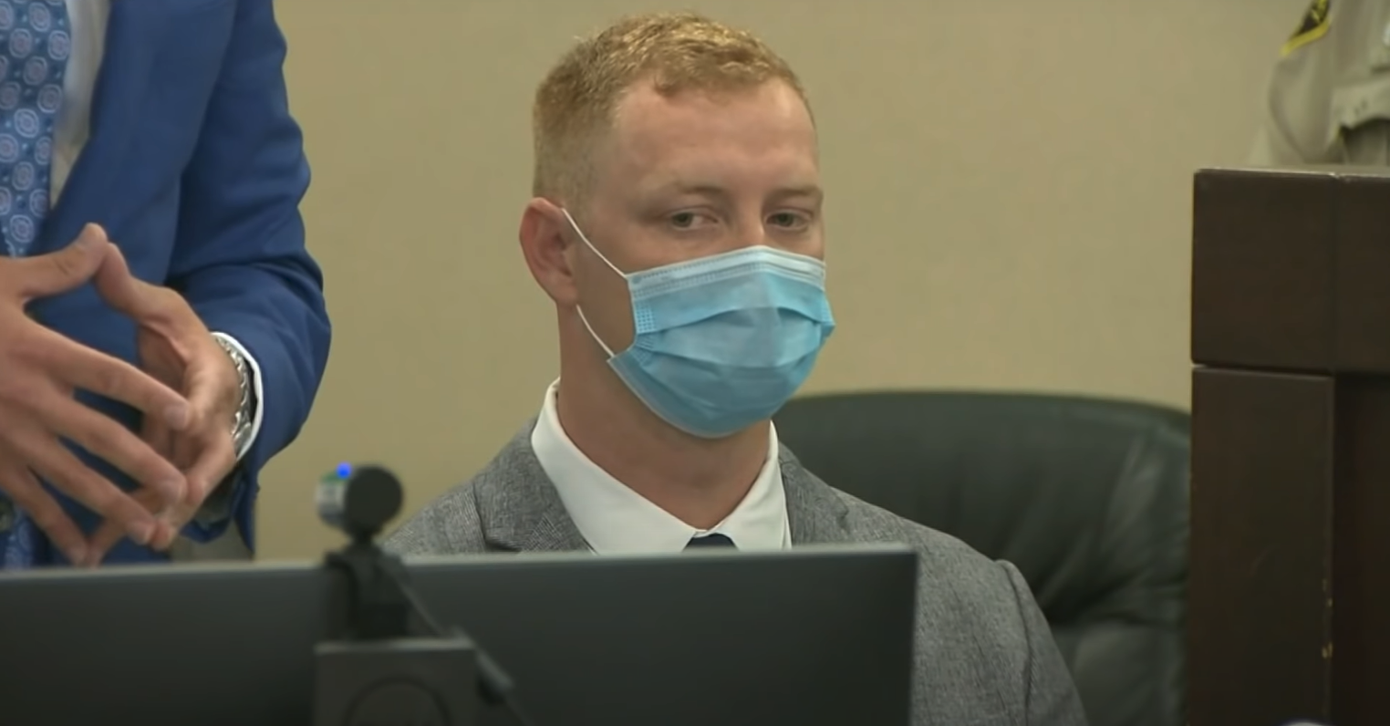 Jaylen Fleer sits wearing a mask