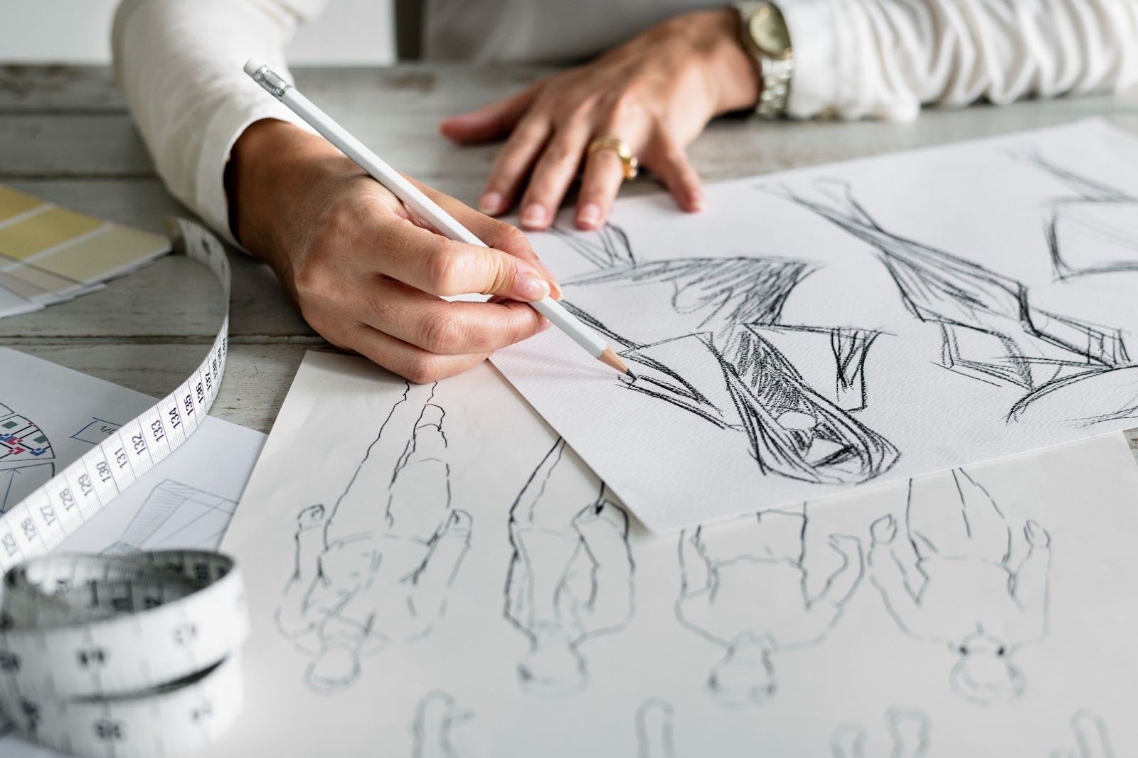 Fashion designer creating new design